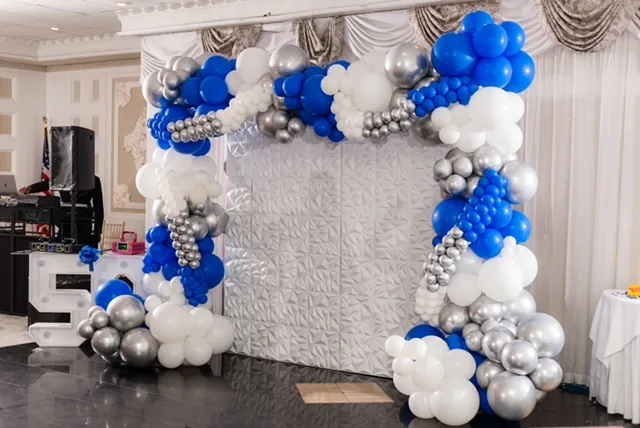 Blue and silver organic balloon installation