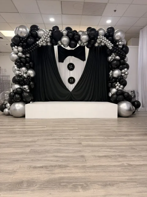 Black and silver formal event arch
